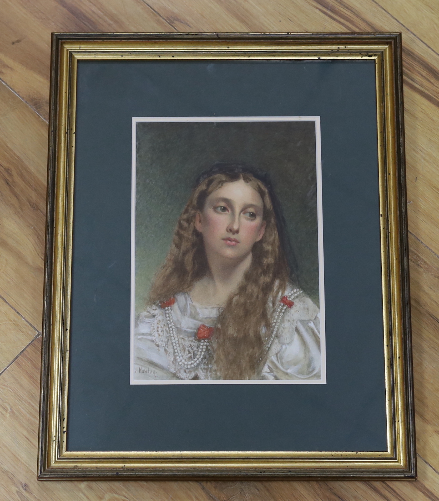 Frank Nowlan R.A (1835-1910), heightened watercolour, Head and shoulders portrait of a lady, signed, 25 x 17cm